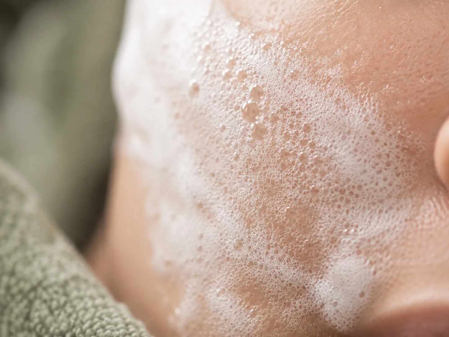 Fine oxygen bubbles foaming on skin during an Oxygen Bubble Lift facial